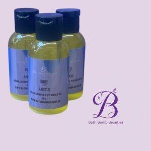 Three yellow bottles with blue labels and dark blue caps, arranged together on a light purple background, beside the Bath Bomb Beauties logo in purple.