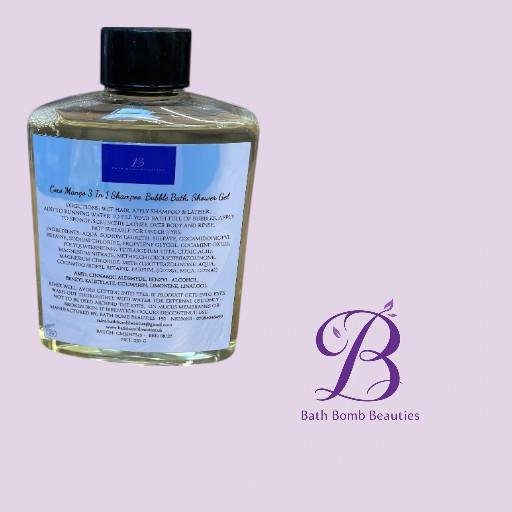 Coco mango bath bomb beauties Plastic bottle of bath bomb beauties shower gelbubble bath with a blue label black cap tilted on a lavender background logo shown nearby