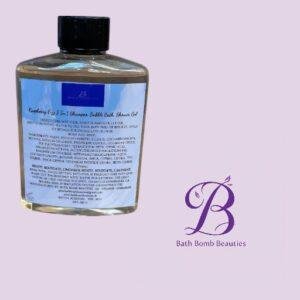 Clear bottle of Raspberry Fizz shampoo from Bath Bomb Beauties with a black cap; purple Bath Bomb Beauties logo on a pale lavender background.