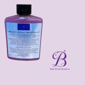 Purple bath product bottle with a black cap on a lavender background, positioned beside the Bath Bomb Beauties logo; label text is not legible in the image.