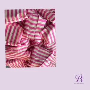 Pile of crumpled pink and white striped wrapping paper or packaging, textured with folds and creases.