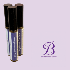 Set of three roll-on lash and brow serums with Bath Bomb Beauties logo on a lavender background.