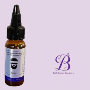Amber glass dropper bottle labeled 'Bad Boy' beard oil (and aftershave balm) from Bath Bomb Beauties on a lavender background with a purple 'BB' logo.