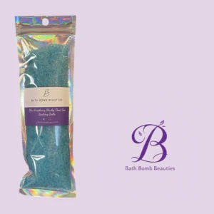 Iridescent bag containing blue raspberry slushy dead sea bath salts from bath bomb beauties on a lavender background with logo