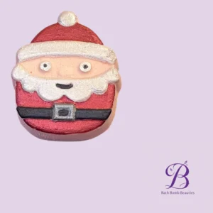 Santa-shaped bath bomb in red suit with white beard and belt on a purple background (bath product image).