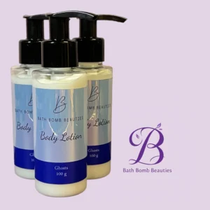 Three pump-bottled lotions labeled Bath Bomb Beauties Body Lotion in front of a lavender background with a purple decorative logo 'B' in the corner.