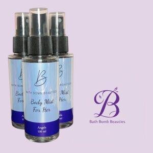 Three spray bottles with blue labels reading bath bomb beauties body mist for her on a lavender background with a purple logo visible