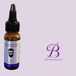 Brown glass beard oil bottle with a black dropper cap on a lavender background bath bomb beauties logo visible to the right