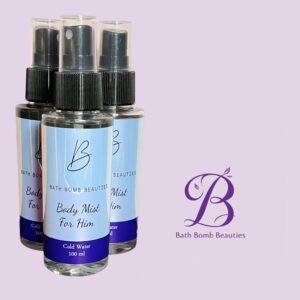 Three spray bottles of bath bomb beauties body mist for him on a lavender background with the brand logo visible to the right
