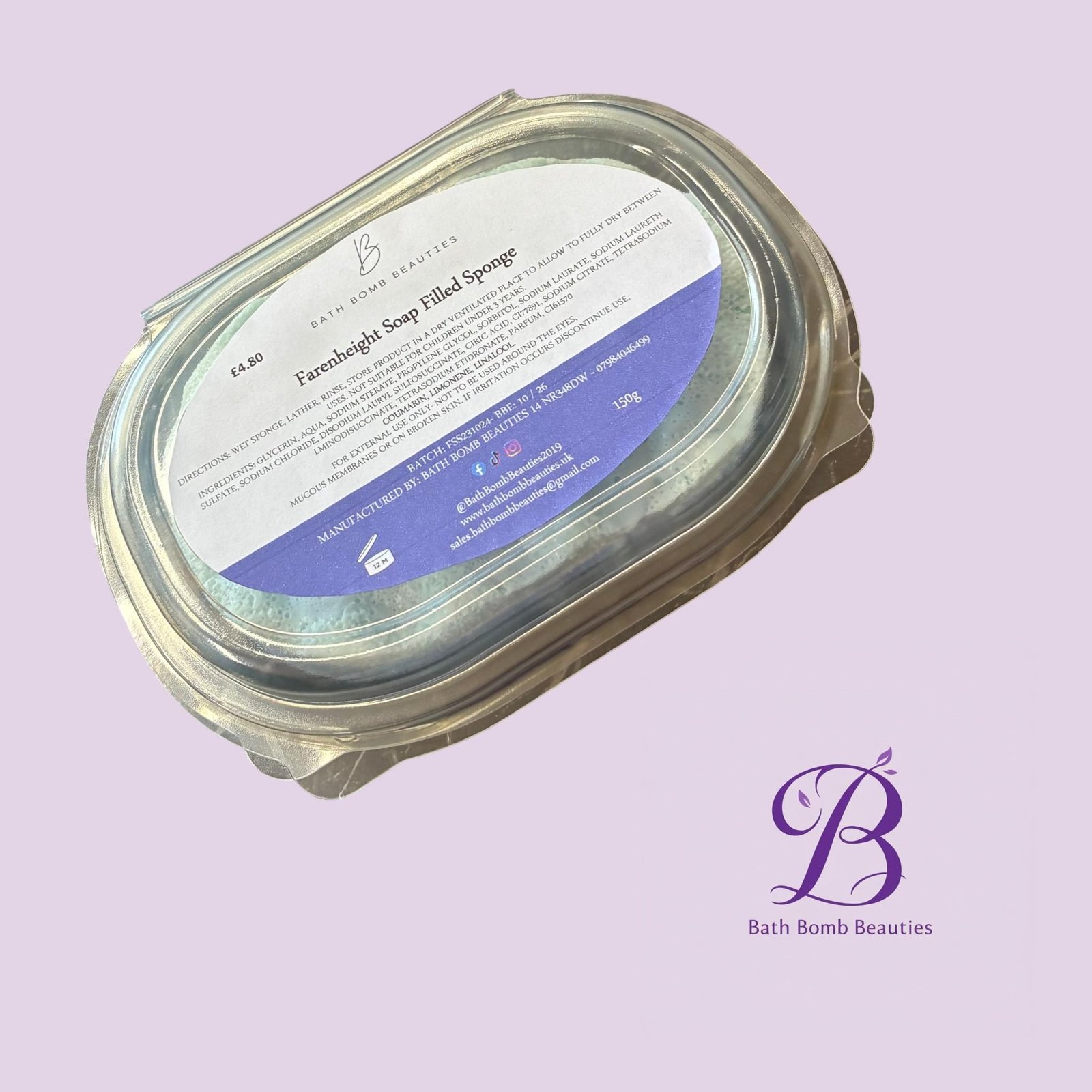 Farenheight exf bath bomb beauties Close up of a metal jar lid with a bath bomb beauties label on a lavender background