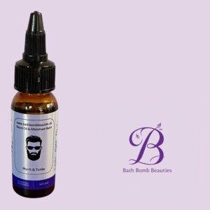 Beard oil bottle labeled myrrh  tonka with a dropper cap beside a bath bomb beauties logo on a pale purple background