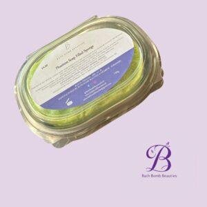 Jar containing a green bath bomb with a product label, set on a lavender background; Bath Bomb Beauties branding visible.