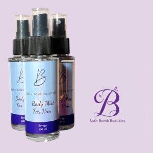 Three bath bomb beauties body mists pictured on a lavender background with a logo nearby for him