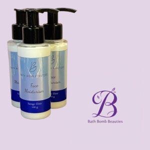 Three white pump bottles labeled Bath Bomb Beauties Face Moisturiser with blue labels, against a lavender background and a purple logo in the corner (product photo).