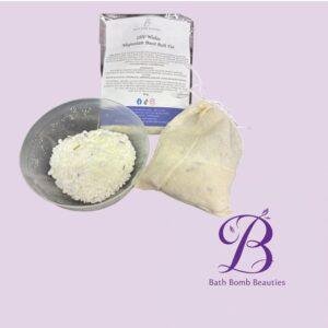 Bath bombs and a pouch of bath salts arranged on a lavender background with the Bath Bomb Beauties logo visible.