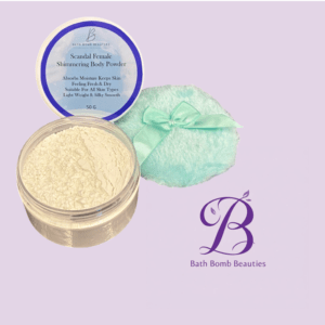 Jar of scandal female shimmering body powder with a blue labeled lid mint cloth and teal ribbon on a lavender background