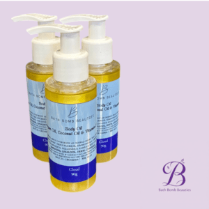 Cloud body oil bath bomb beauties Three bath bomb beauties body oil bottles with pump dispensers sit on a lavender background blue labels and logo bottom right