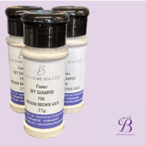 Three bath bomb beauties fame dry shampoo bottles for medium brown hair on a lavender background with the logo in the corner