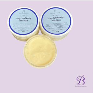 Three jars of Lost Cherry Deep Conditioning Hair Mask on a lavender background, blue-labeled containers with Bath Bomb Beauties logo in the bottom-right.